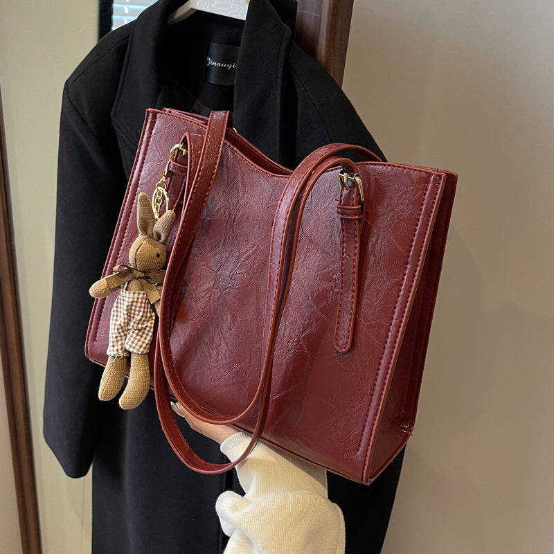 🎅Christmas Carnival Delivery🥳👜Women's Trendy Shoulder Bag with Doll Pendant