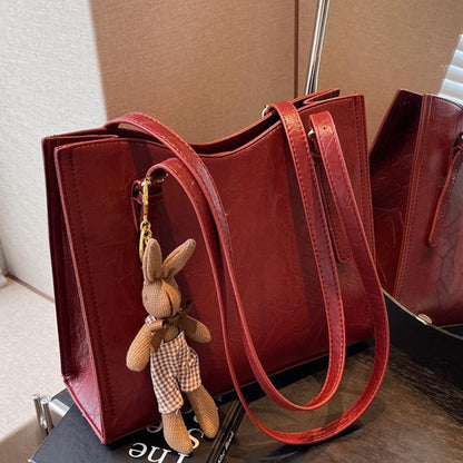 🎅Christmas Carnival Delivery🥳👜Women's Trendy Shoulder Bag with Doll Pendant