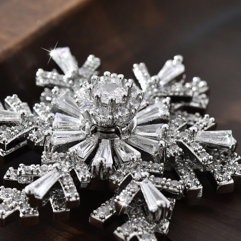 Luxury Rotating Snowflake Brooch