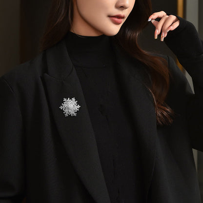 Luxury Rotating Snowflake Brooch